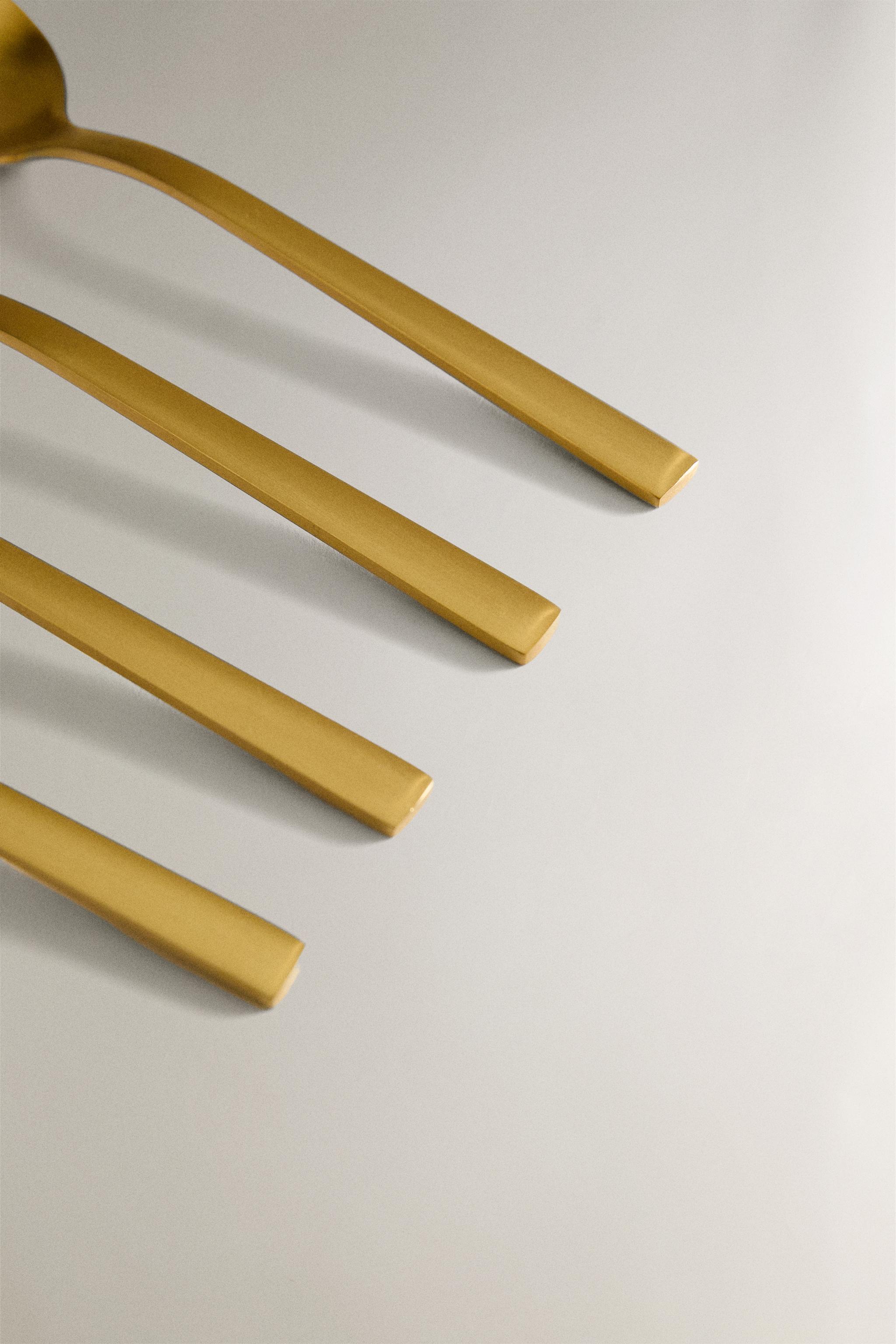 LOT DE 4 CUILLÈRES EN ACIER DORÉ